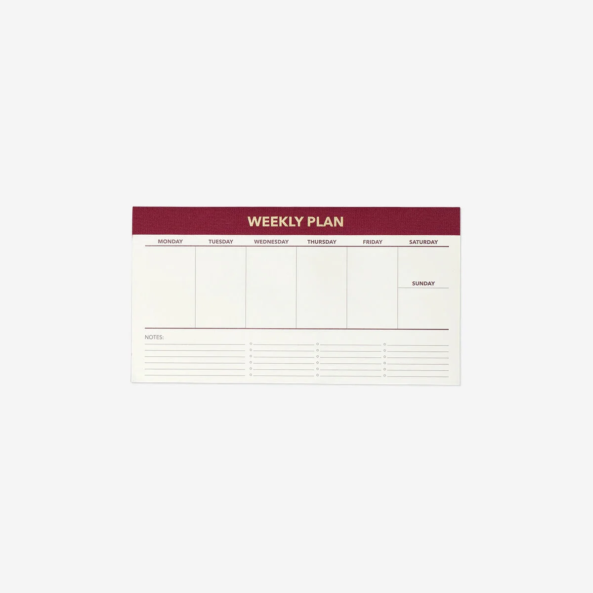 Red weekly planner for desk