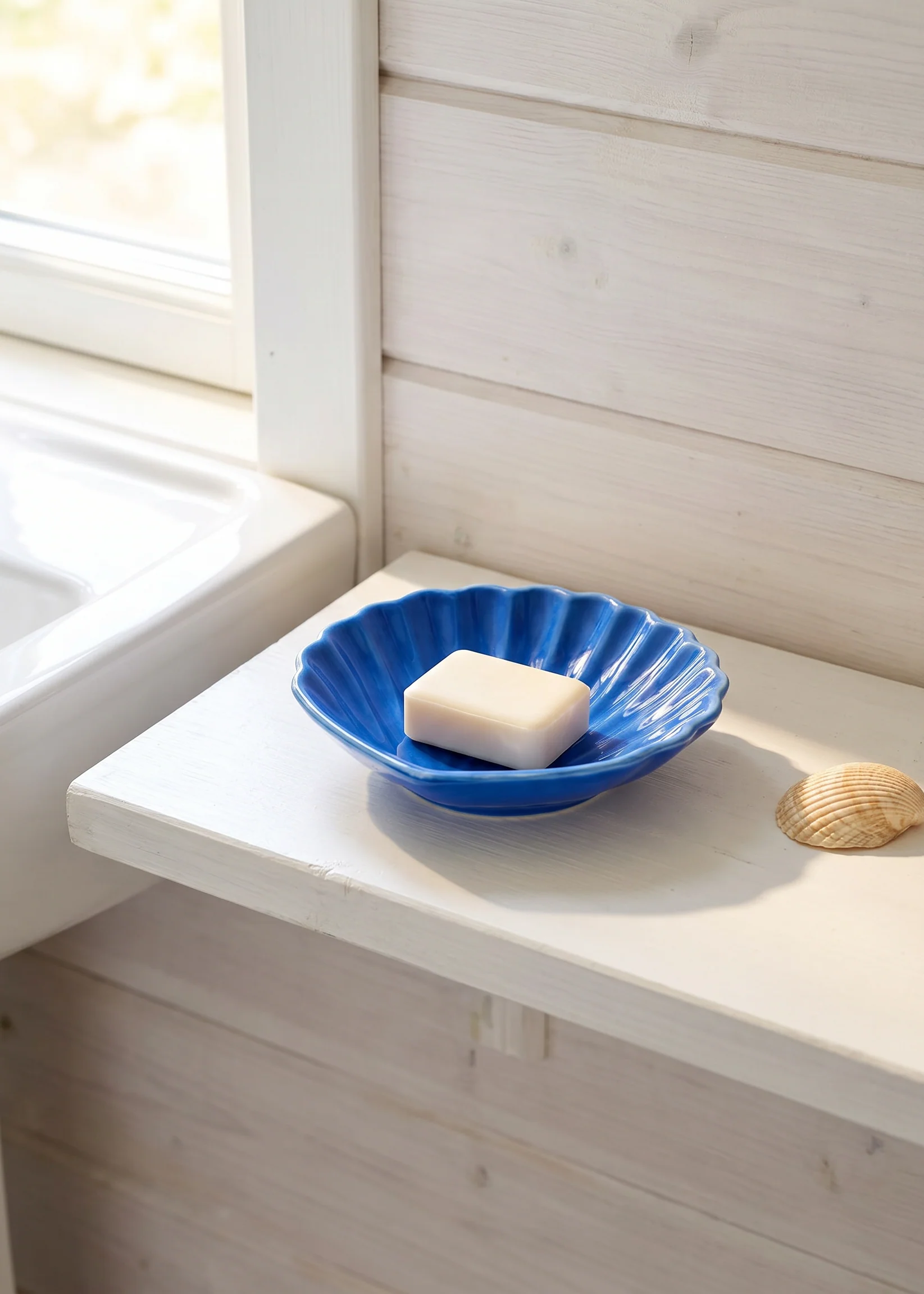 Blue ceramic seashell soap dish
